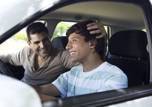 Wiley Insurance Services | Rock Hill, SC | Father teaching teenage son how to drive